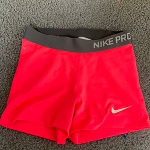 neon pink nike pros